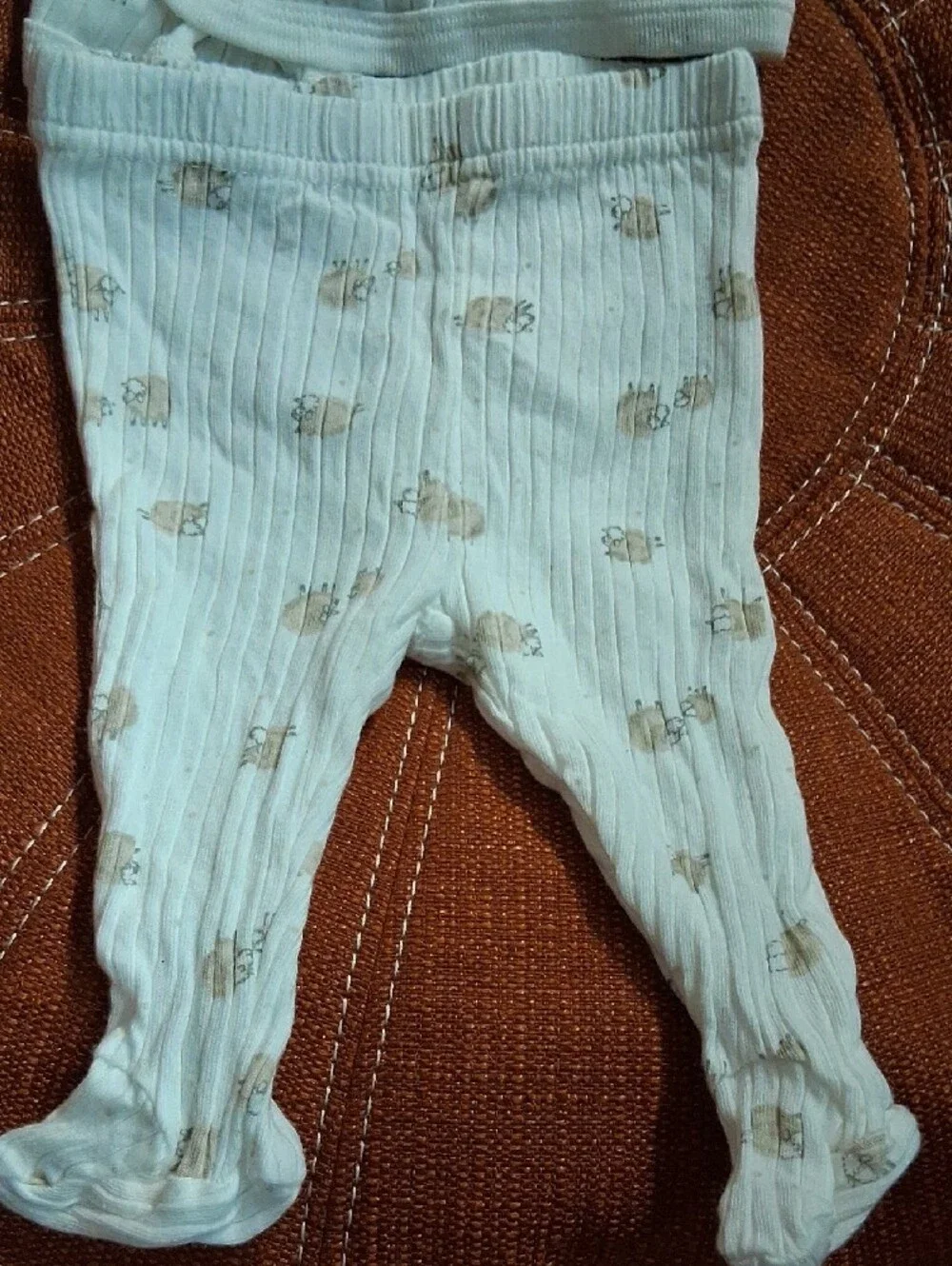 Cream Ribbed Infant Footed One-Piece with Tan Animal Print